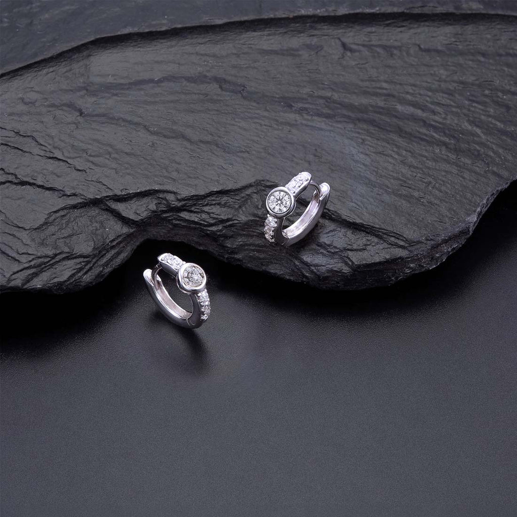 Bezel Zirconia Hoop Earrings Cubic Zirconia in Sterling Silver on rocks
