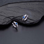 Bezel Blue Zirconia Hoop Earrings Cubic Zirconia in Sterling Silver on rocks