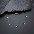 Triangle Charm Bracelet for Women Sterling Silver with Cubic Zirconia near black rock