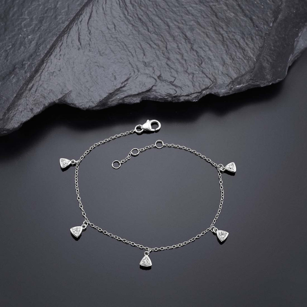 Diamonte Charm Bracelet for Women in Sterling Silver & Cubic Zirconia near black rock