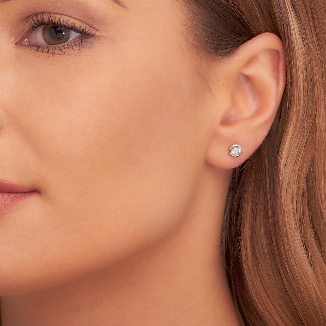 Solitaire 0.40ct Bezel set round diamond studs in 18K white gold