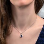 925 sterling silver with blue stone