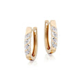 Wave 0.25ct diamond hoop earrings in 9K yellow gold