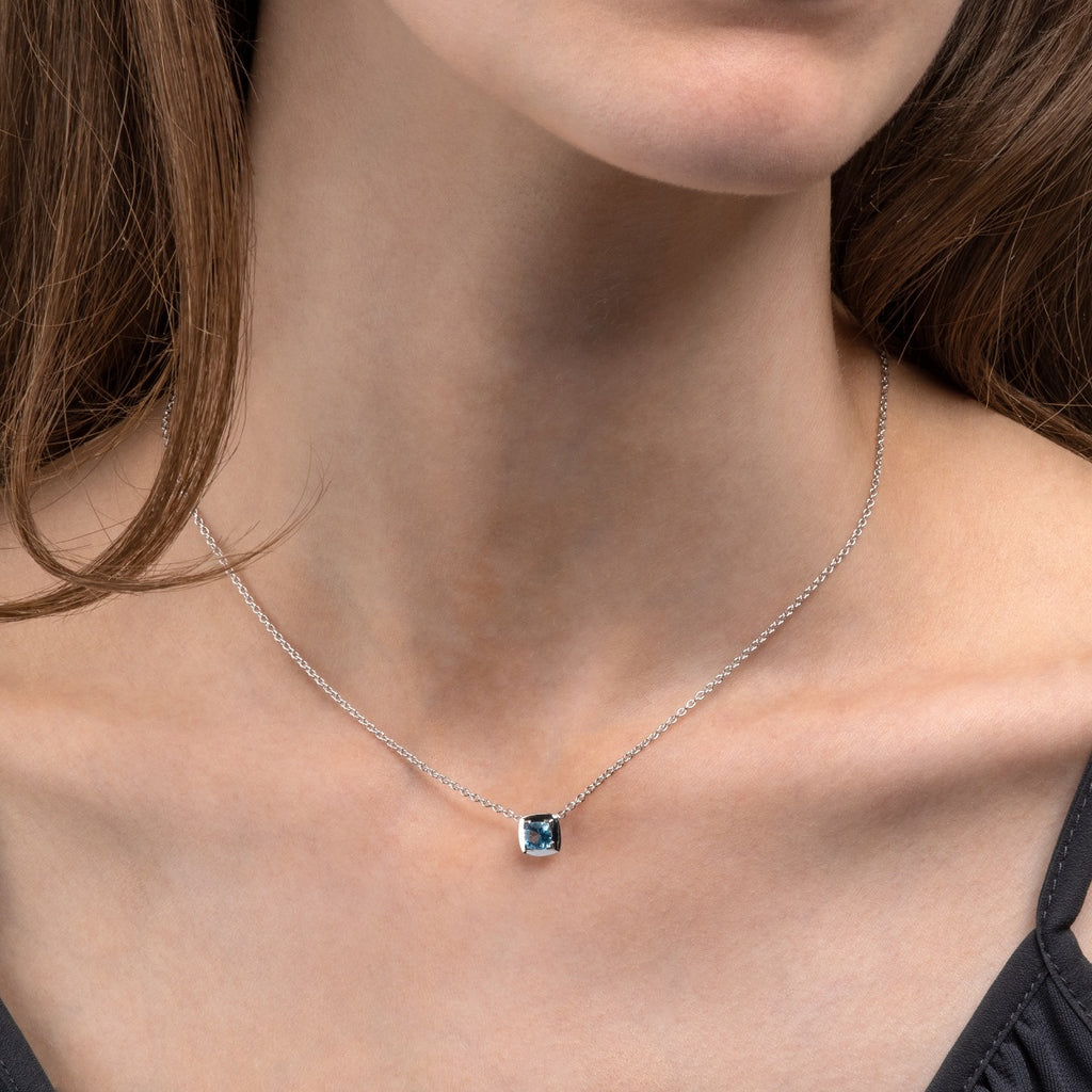 0.65ct Cushion Cut Swiss Blue Topaz Pendant Necklace In 18K White Gold