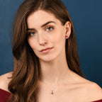 Round Ruby Stud Earrings with 0.24ct Diamond Halo 9K White Gold