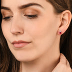 Oval Ruby Stud Earrings with 0.10ct Diamonds 9K White Gold