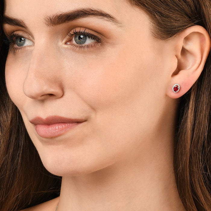 Oval Ruby Stud Earrings with 0.18ct Diamonds 18K White Gold