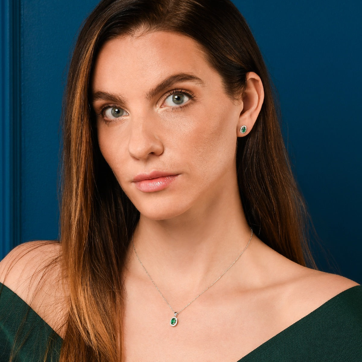 Oval Emerald Stud Earrings with 0.18ct Diamonds 18K White Gold