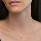Interlocking heart shape 0.07ct diamond pendant in 9K yellow gold