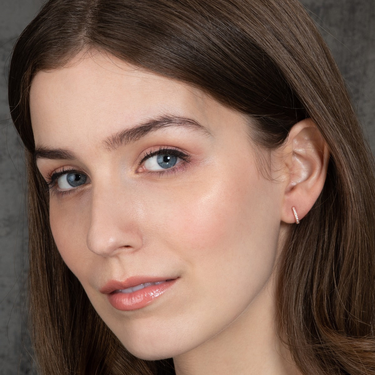 Small Rose Gold Huggie Hoop Earrings in Sterling Silver