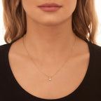 Solitaire 0.20ct 6 claw round diamond twirl pendant in 9K yellow gold