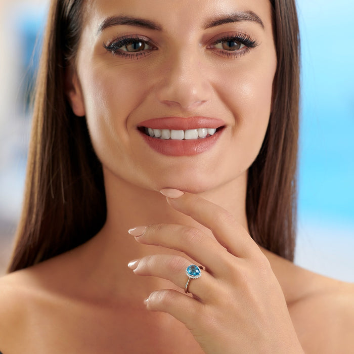 Pear Blue Topaz Ring 7x9mm Topaz & 0.14ct Diamonds 18K White Gold