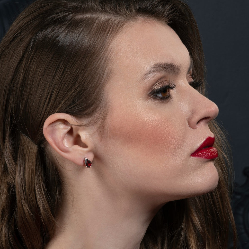 Pear Shaped Garnet Stud Earrings in Sterling Silver