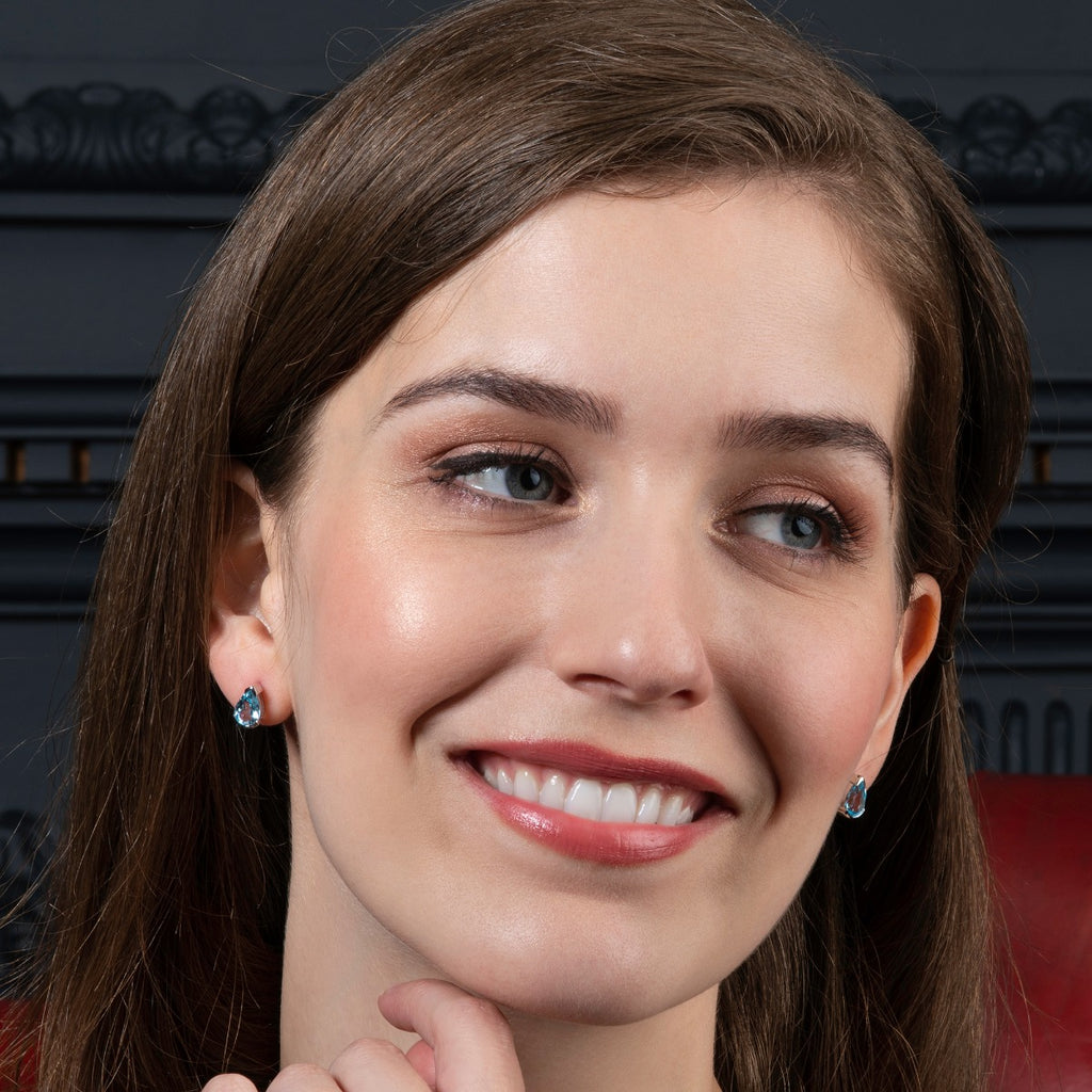 Pear Shaped Blue Topaz Stud Earrings in Sterling Silver