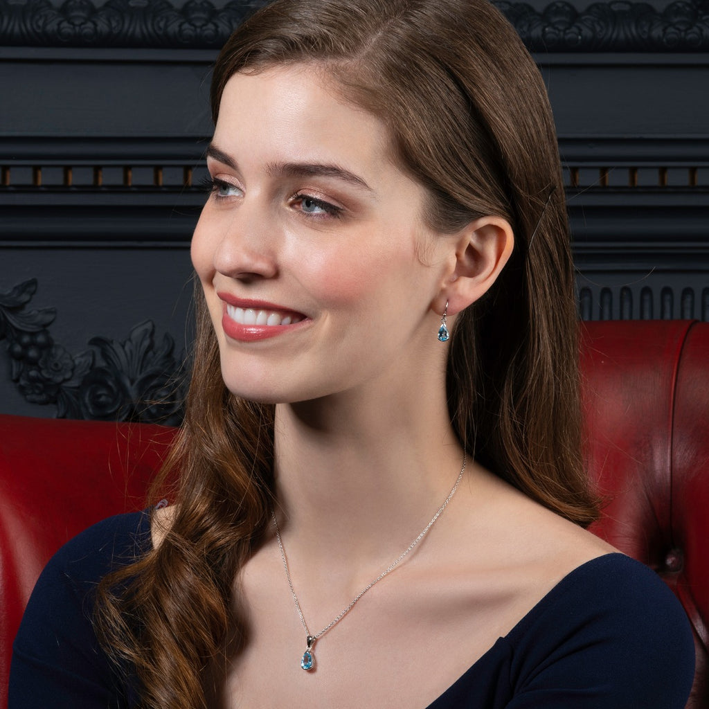 Pear Shaped Blue Topaz Drop Earrings in Sterling Silver