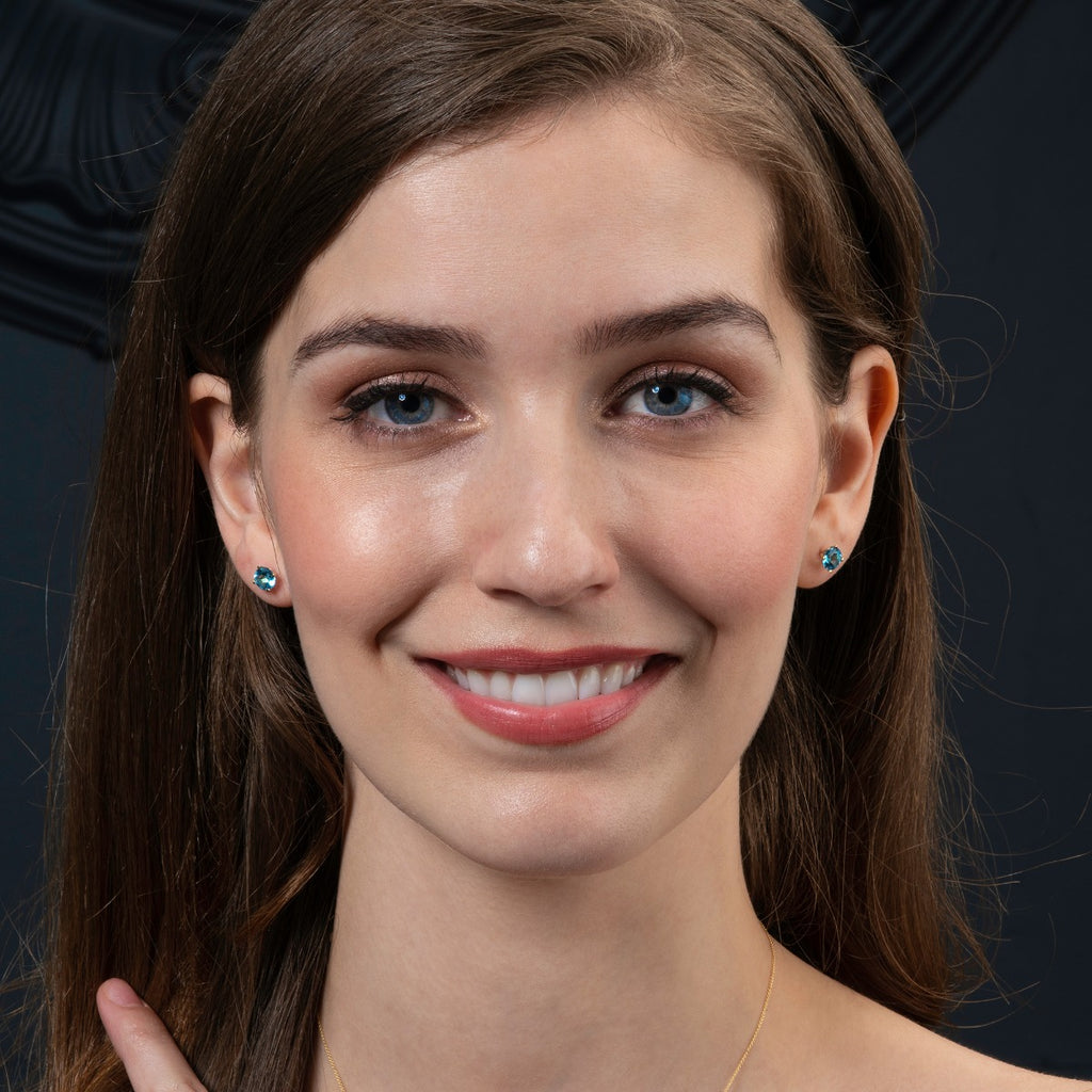 1.90ct Swiss Blue Topaz Solitaire Stud Earrings In 9K Yellow Gold