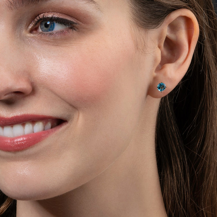 1.90ct Swiss Blue Topaz Solitaire Stud Earrings In 9K Yellow Gold