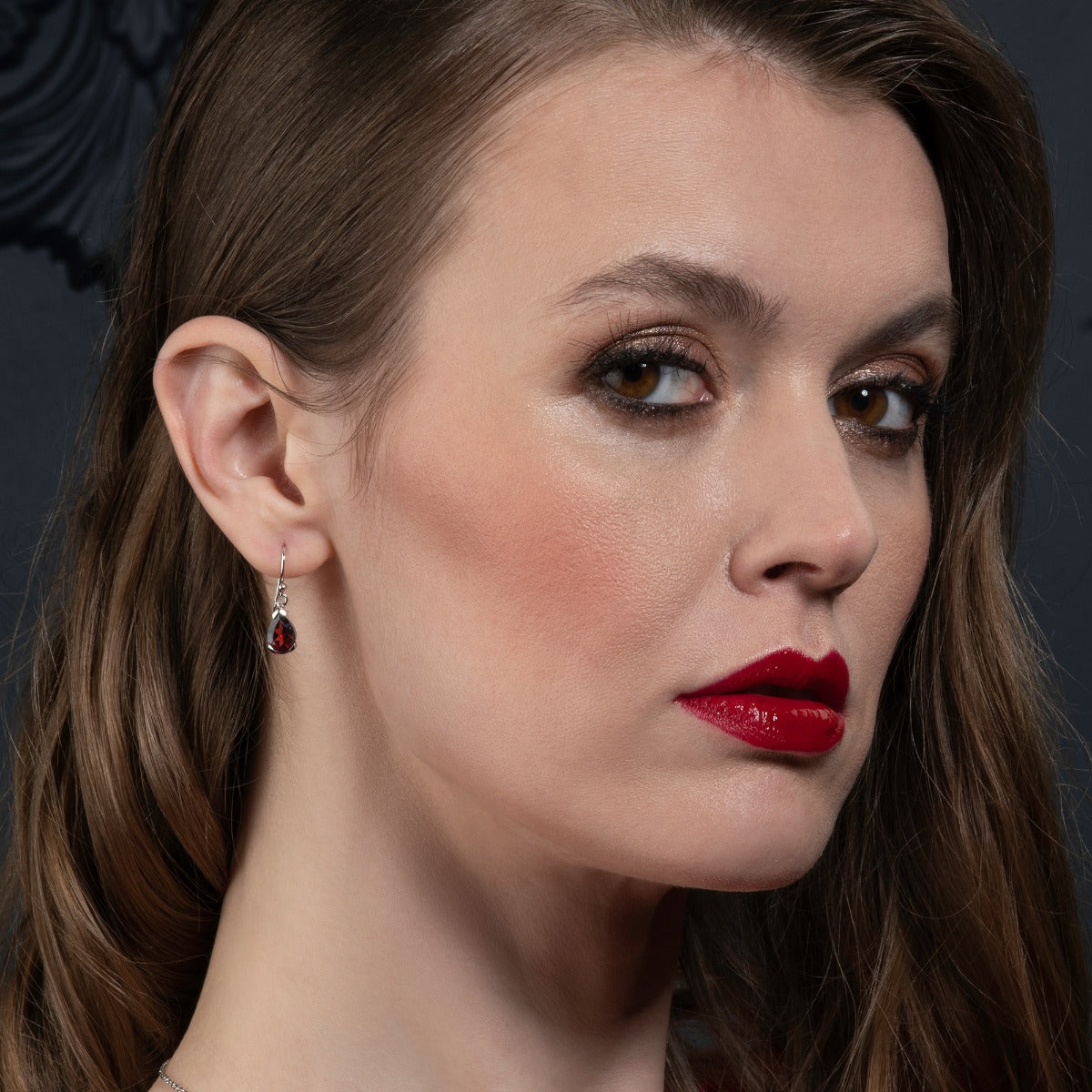 Pear Shaped Garnet Drop Earrings in Sterling Silver