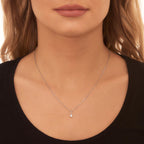 Solitaire 0.20ct bar set round diamond pendant in 18K white gold