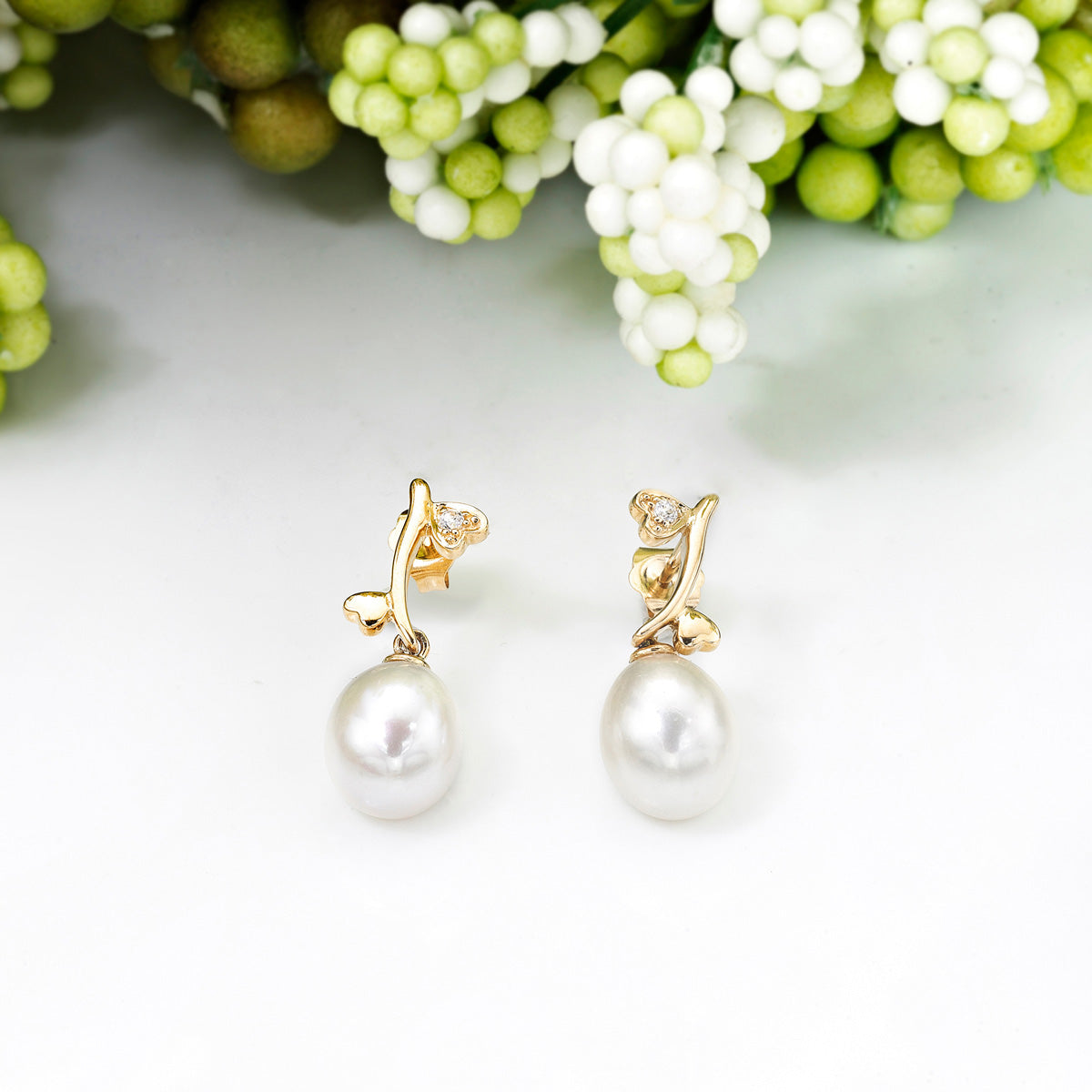 Pearl Drop Earrings with Cubic Zirconia Hearts in 9K Yellow Gold
