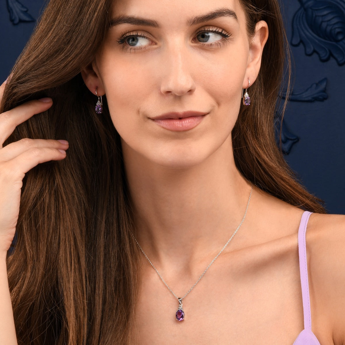 Oval Shaped Amethyst Drop Earrings in Sterling Silver
