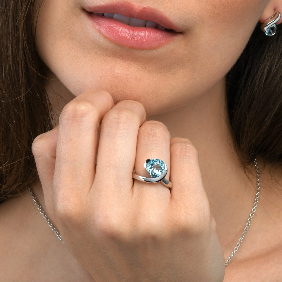 Sterling Silver Ring with a Pear-Shaped Blue Topaz Gemstone