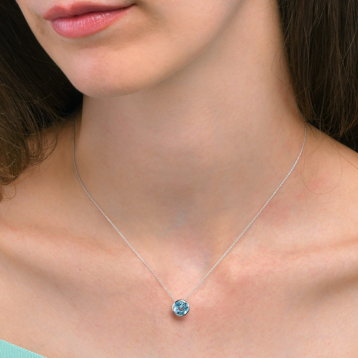 Bezel Set Blue Topaz Pendant Necklace in Sterling Silver