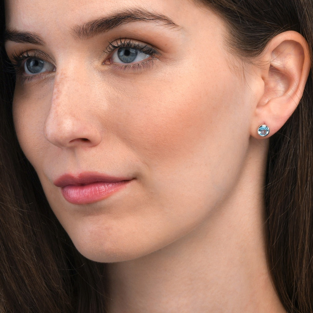 Bezel Set Blue Topaz Stud Earrings in Sterling Silver