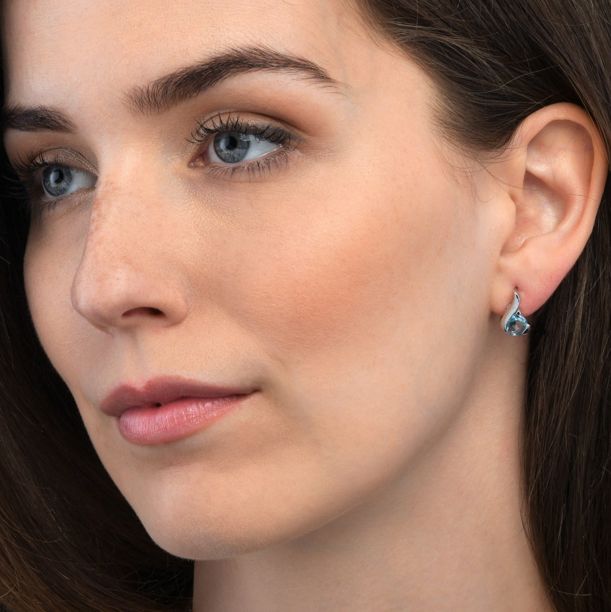 Blue Topaz Pear Shaped Earrings in Sterling Silver