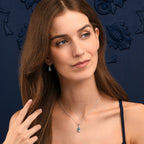 Oval Shaped Blue Topaz Pendant Necklace in Sterling Silver