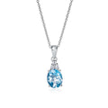 Oval Shaped Blue Topaz Pendant Necklace in Sterling Silver