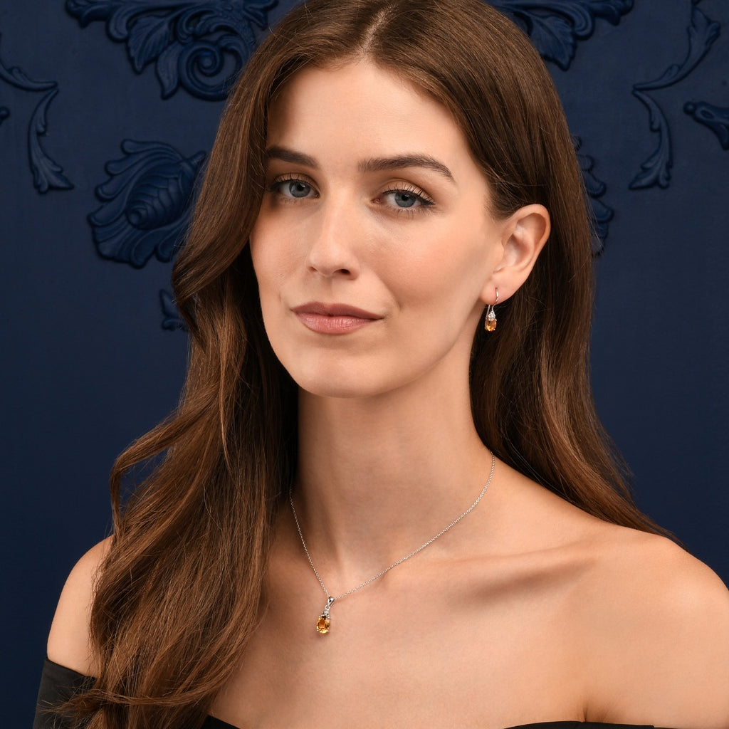 Oval Shaped Citrine Drop Earrings in Sterling Silver
