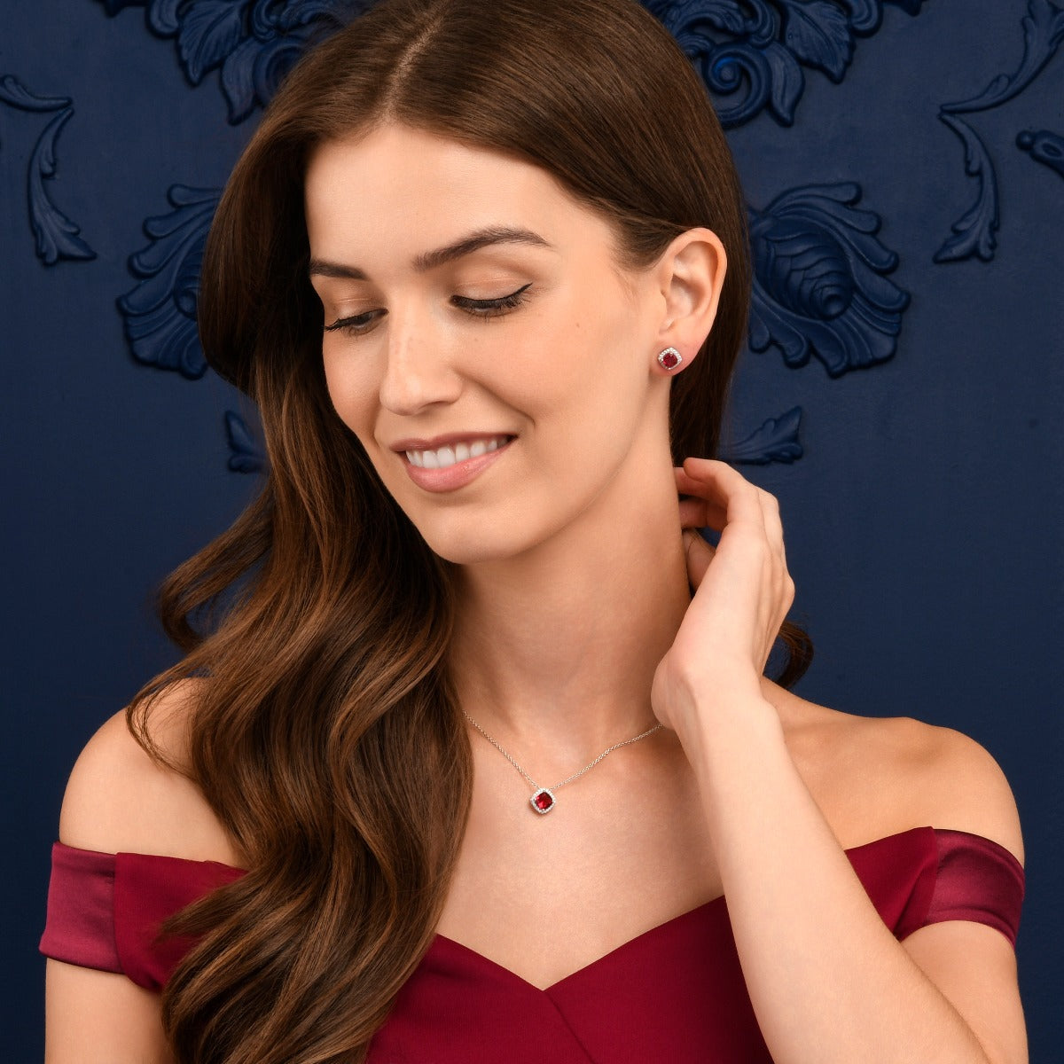 Sterling Silver Red Cushion Shaped Halo Stud Earrings