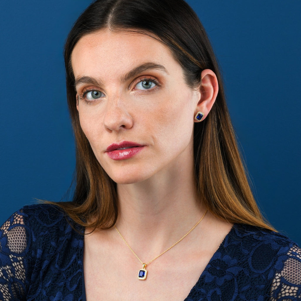 Gold Plated Sterling Silver Emerald Cut Blue Halo Stud Earrings