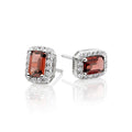 4mm x 6mm Garnet and 0.15ct diamond stud earrings in 9K white gold