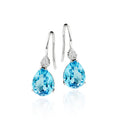 8mm x 10mm Pear shape Blue Topaz and 0.10ct diamond earrings in 9K white gold 
