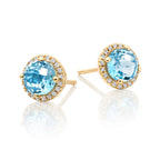 6mm Blue Topaz and 0.12ct diamond stud earrings in 18K yellow gold 