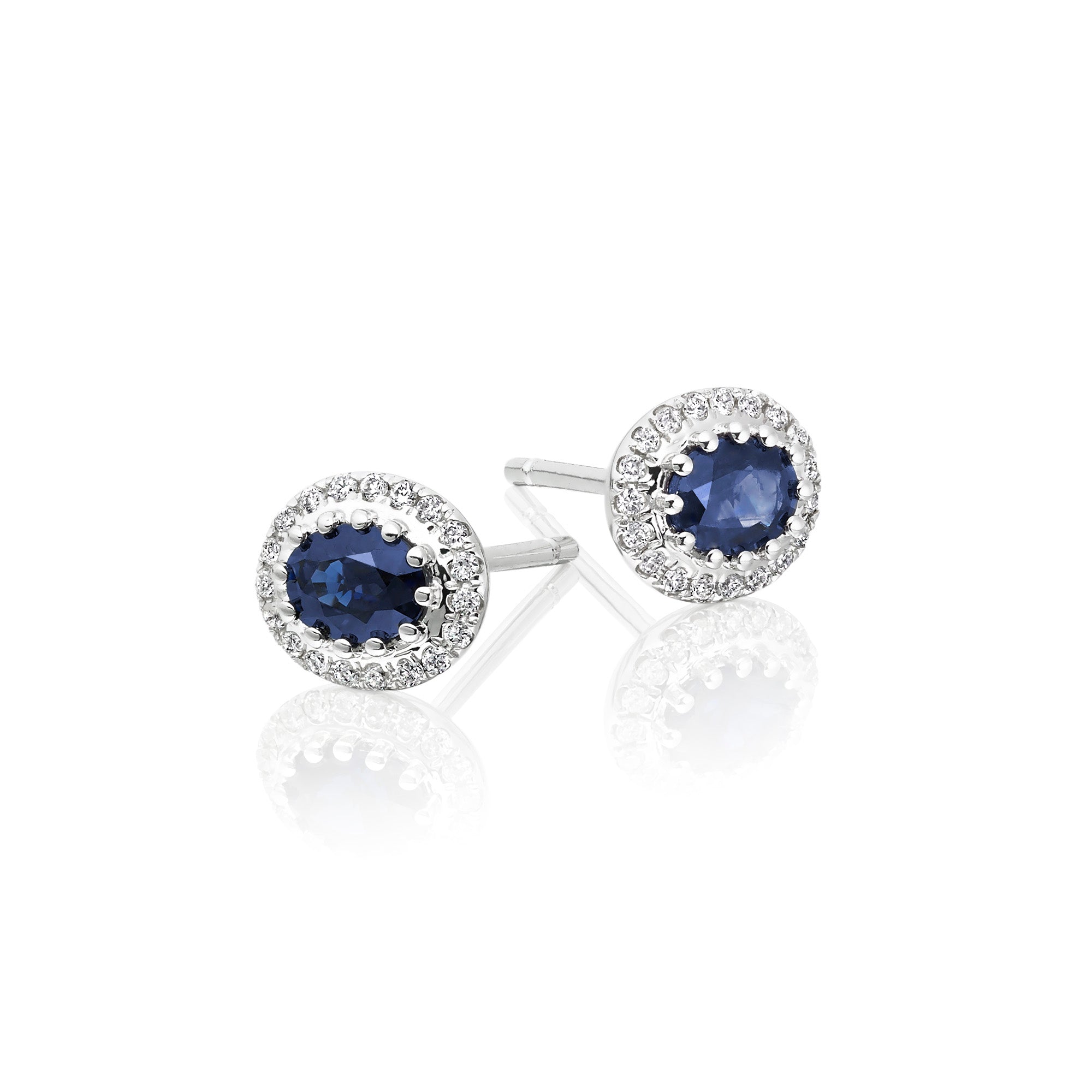 Oval Sapphire and 0.11ct diamond stud earrings in 18K white gold