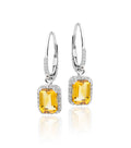 5mm x 7mm Citrine and 0.20ct diamond earrings in 9K white gold