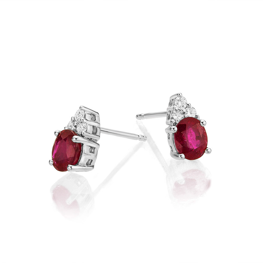 Oval Ruby Stud Earrings with 0.10ct Diamonds 9K White Gold