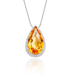 8mm x 13mm Citrine with 0.17ct Diamond pendant in 18K white gold