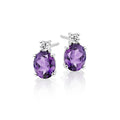 5mm x 7mm Amethyst and 0.07ct diamond stud earrings in 9K white gold