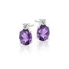 5mm x 7mm Amethyst and 0.07ct diamond stud earrings in 9K white gold