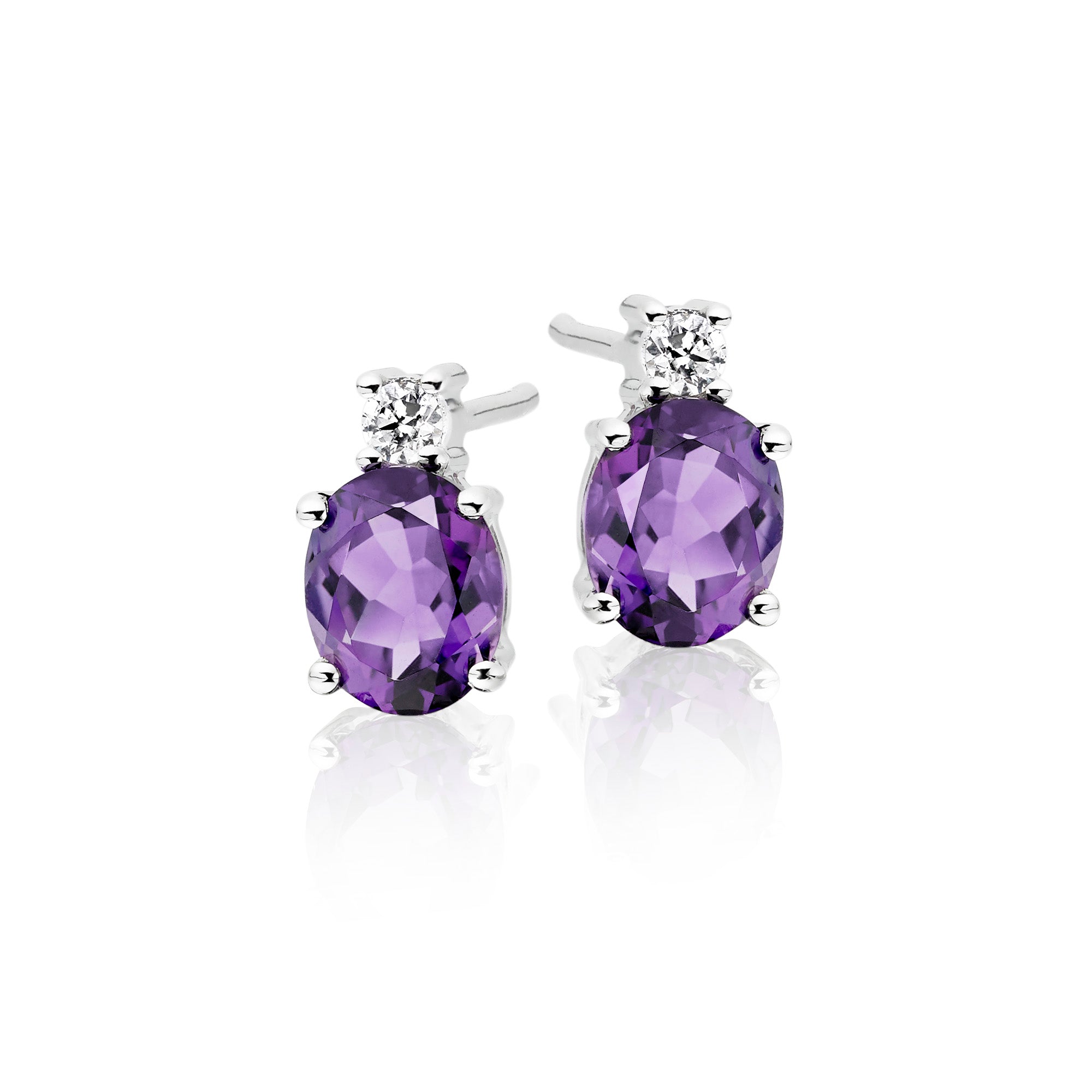 5mm x 7mm Amethyst and 0.07ct diamond stud earrings in 9K white gold