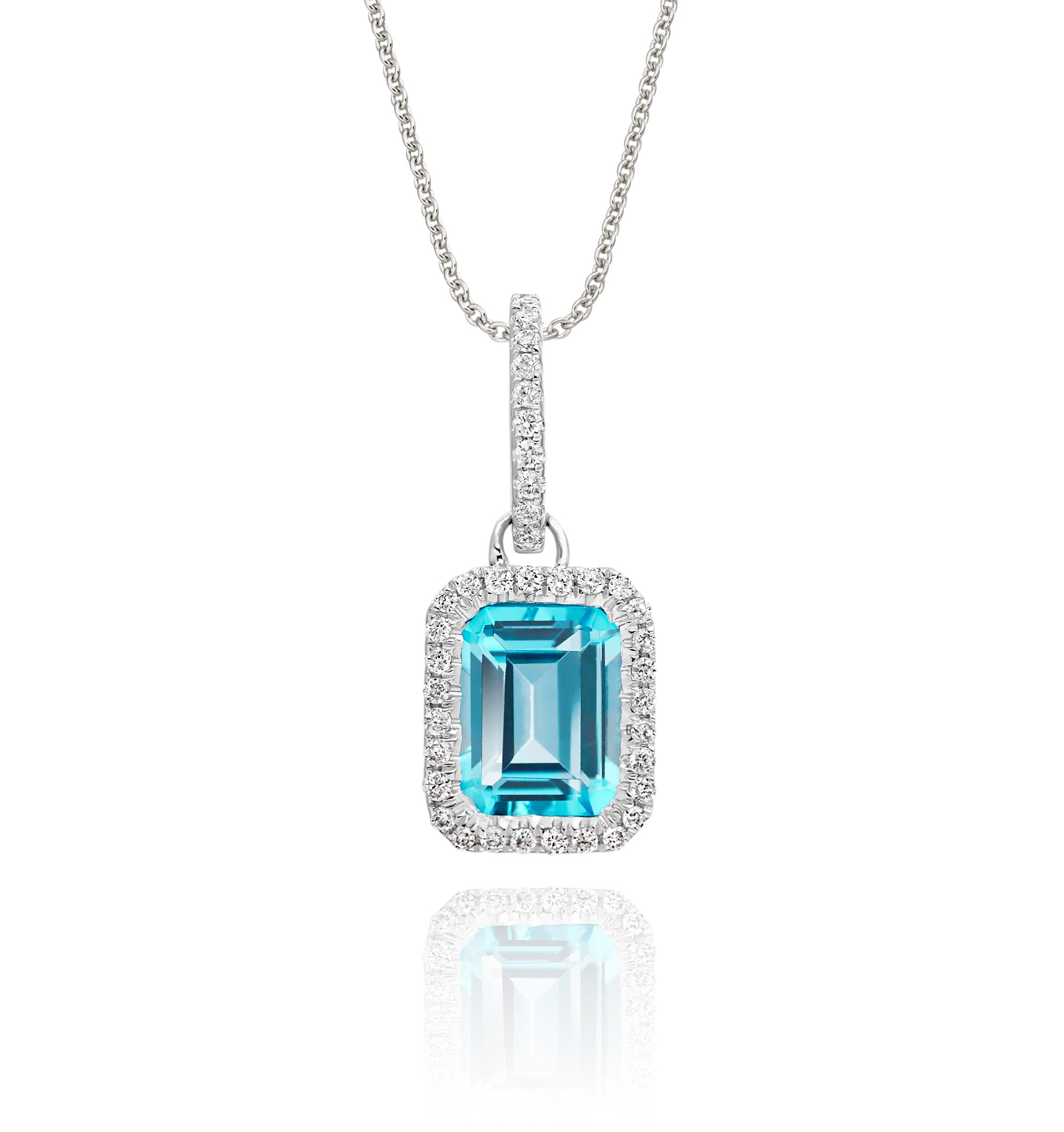 5mm x 8mm Blue Topaz with 0.15ct Diamond pendant in 9K white gold