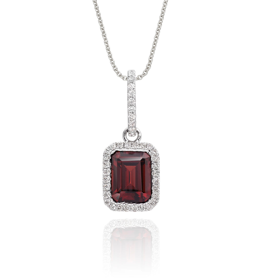 5mm x 8mm Garnet with 0.15ct Diamond pendant in 9K white gold