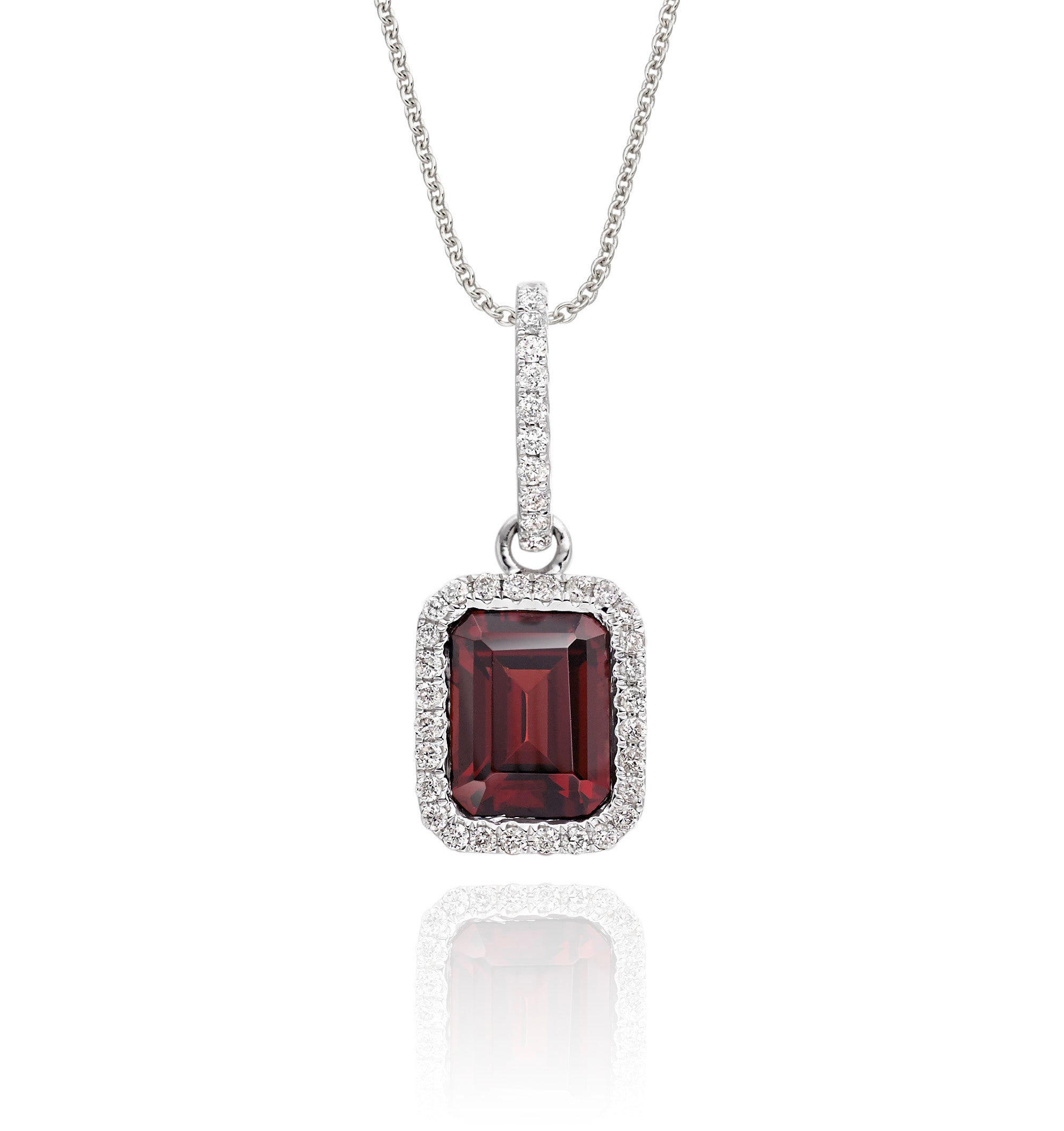5mm x 8mm Garnet with 0.15ct Diamond pendant in 9K white gold