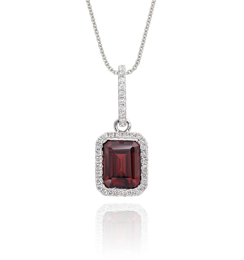 5mm x 8mm Garnet with 0.15ct Diamond pendant in 9K white gold