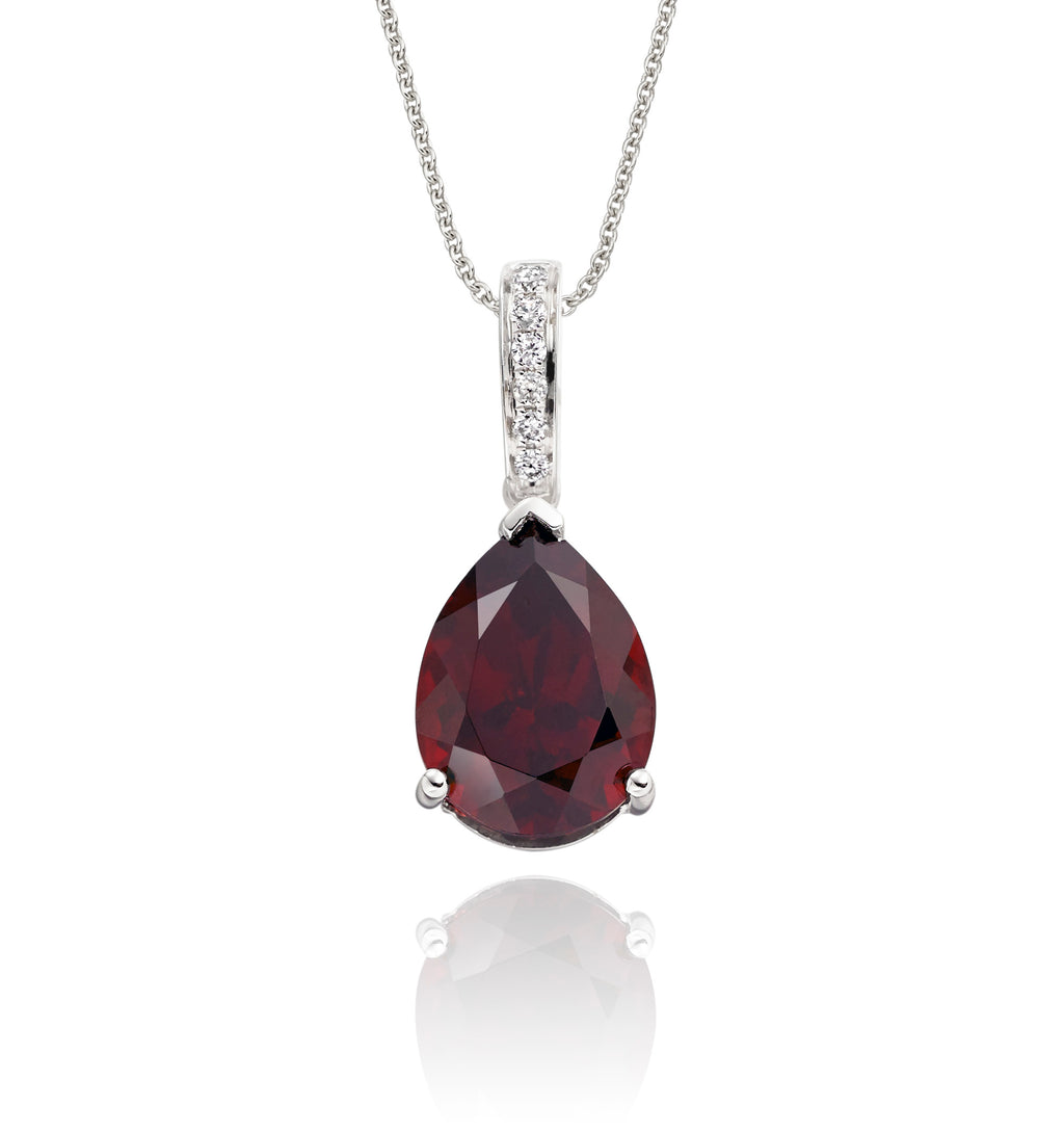 8mm x 12mm Garnet with 0.05ct Diamond pendant in 9K white gold