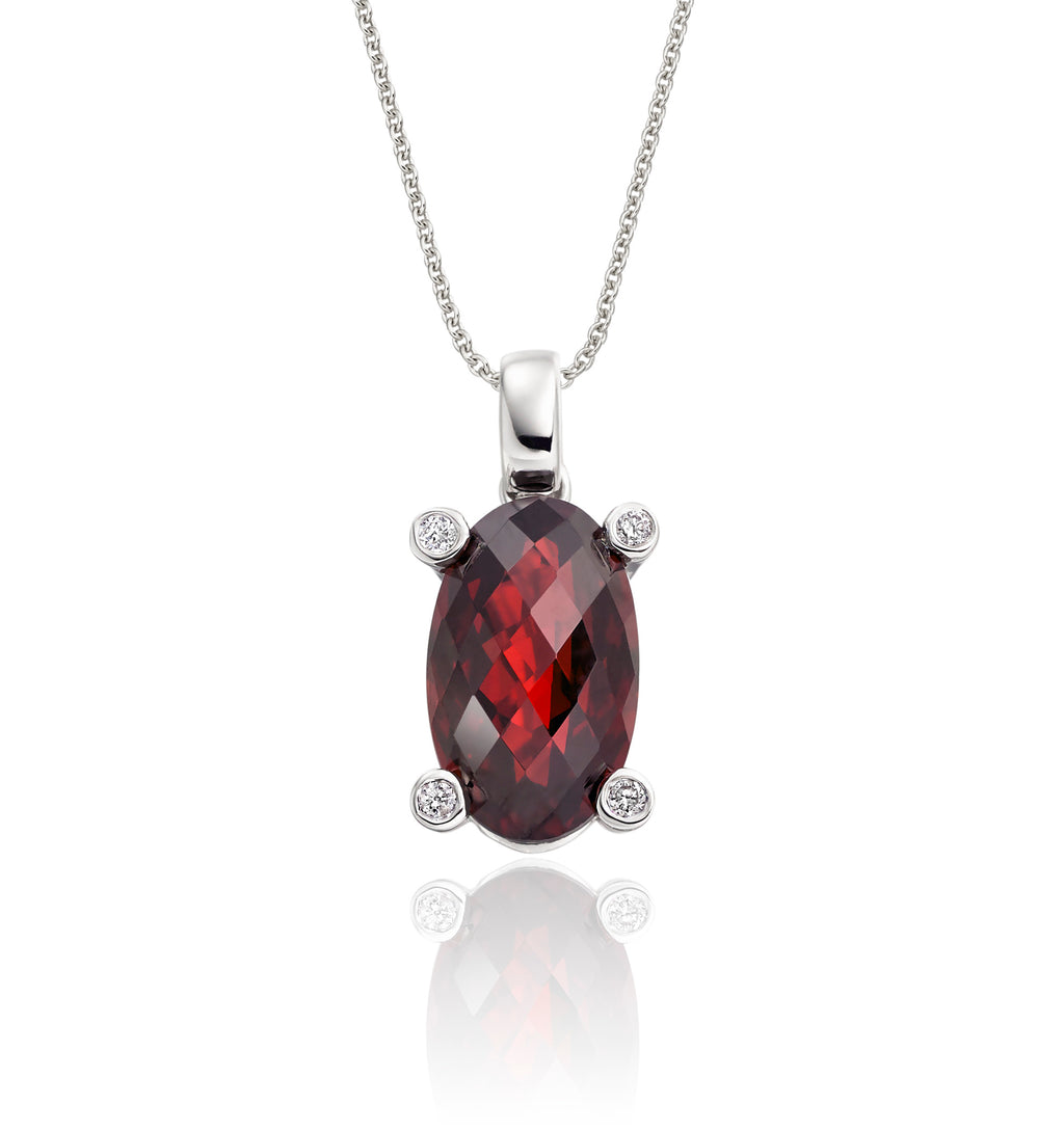7mm x 12mm Garnet with 0.03ct Diamond pendant in 9K white gold